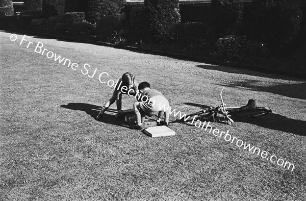 JOHN MALLICK PLAYING WITH HIS COUSINS O'NEILL & MRS O'NEILL AT MALLICKS ON CURRAGH